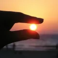 summer sunset held between two fingers