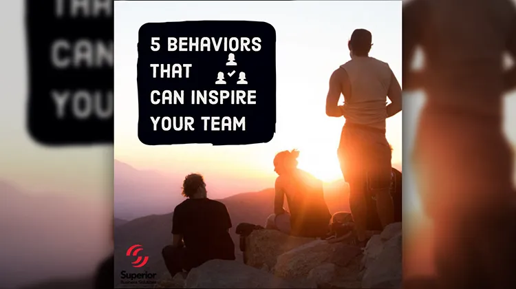Atop a mountain at sunset - 5 Behaviors That Can Inspire Your Team to Succeed