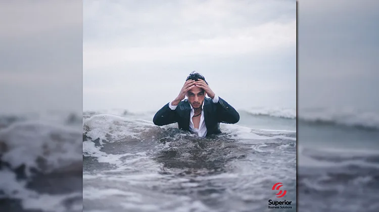 Stressed-out businessman in water