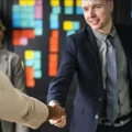 Business partner shaking hands