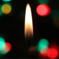 Holiday candle scene with bokeh effect